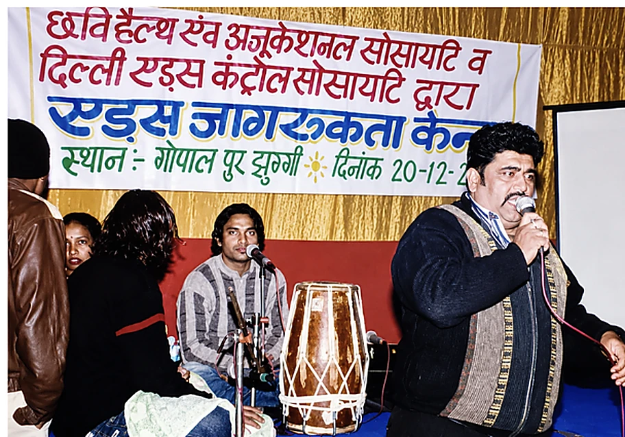 A CHES HIV/AIDS awareness event with a speaker addressing the audience